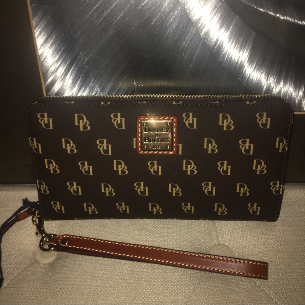 Brand new Dooney & Burke Large zip around wristlet